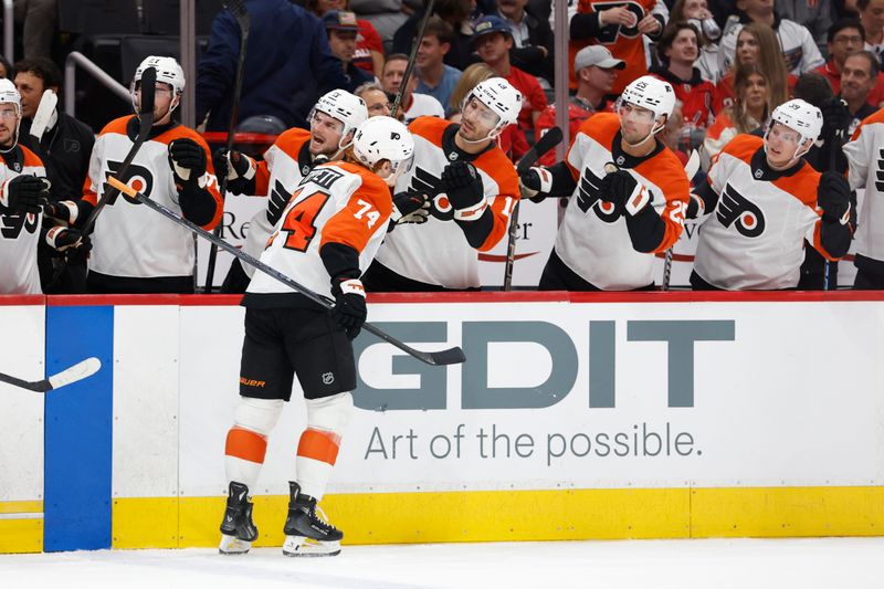 Oct 23, 2024; Washington, District of Columbia, USA; Philadelphia Flyers right wing Owen Tippett (74) celebrates with teammates after scoring a goal against the Washington Capitals in the second period at Capital One Arena. Mandatory Credit: Geoff Burke-Imagn Images