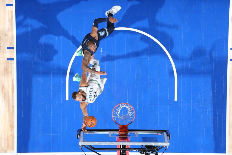 MINNEAPOLIS, MN -  JANUARY 18: Rudy Gobert #27 of the Minnesota Timberwolves drives to the basket during the game against the Memphis Grizzlies on January 18, 2024 at Target Center in Minneapolis, Minnesota. NOTE TO USER: User expressly acknowledges and agrees that, by downloading and or using this Photograph, user is consenting to the terms and conditions of the Getty Images License Agreement. Mandatory Copyright Notice: Copyright 2024 NBAE (Photo by David Sherman/NBAE via Getty Images)