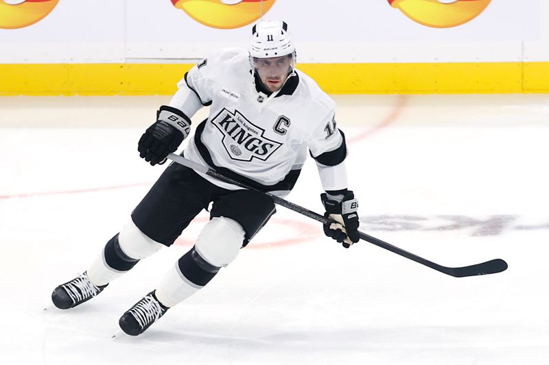 Oct 11, 2025; Winnipeg, Manitoba, CAN; Los Angeles Kings center Anze Kopitar (11) warms up before a game against the Winnipeg Jets at Canada Life Centre. Mandatory Credit: James Carey Lauder-Imagn Images
