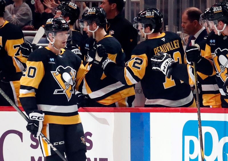 Oct 4, 2024; Pittsburgh, Pennsylvania, USA;  Pittsburgh Penguins center Lars Eller (20) celebrates his goal with the Pittsburgh Penguins bench against the Columbus Blue Jackets during the second period at PPG Paints Arena. Mandatory Credit: Charles LeClaire-Imagn Images