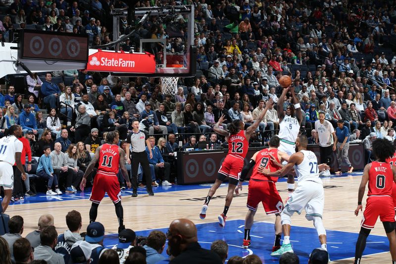 MINNEAPOLIS, MN -  MARCH 31: Anthony Edwards #5 of the Minnesota Timberwolves drives to the basket during the game against the Chicago Bulls on March 31, 2024 at Target Center in Minneapolis, Minnesota. NOTE TO USER: User expressly acknowledges and agrees that, by downloading and or using this Photograph, user is consenting to the terms and conditions of the Getty Images License Agreement. Mandatory Copyright Notice: Copyright 2024 NBAE (Photo by David Sherman/NBAE via Getty Images)