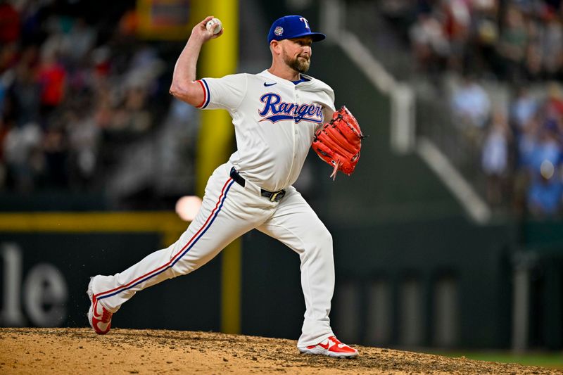 Jul 6, 2024; Arlington, Texas, USA; Texas Rangers relief pitcher Kirby Yates (39) pitches against the Tampa Bay Rays during the ninth inning at Globe Life Field. Mandatory Credit: Jerome Miron-USA TODAY Sports