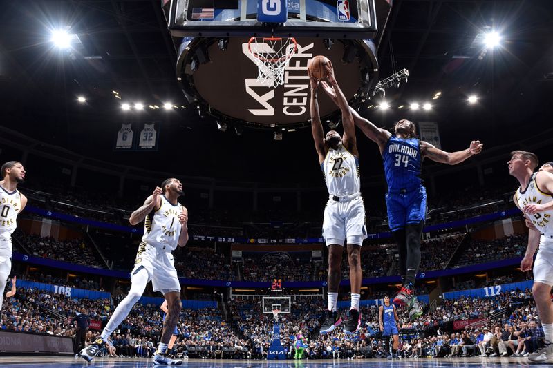 ORLANDO, FL - MARCH 10: Isaiah Jackson #22 of the Indiana Pacers grabs the rebound during the game on March 10, 2024 at Amway Center in Orlando, Florida. NOTE TO USER: User expressly acknowledges and agrees that, by downloading and or using this photograph, User is consenting to the terms and conditions of the Getty Images License Agreement. Mandatory Copyright Notice: Copyright 2024 NBAE (Photo by Fernando Medina/NBAE via Getty Images)