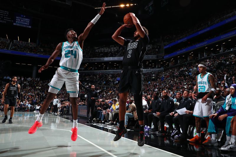 BROOKLYN, NY - NOVEMBER 19: Cameron Johnson #2 of the Brooklyn Nets shoots a three point basket during the game Charlotte Hornets  during an Emirates NBA Cup game on November 19, 2024 at Barclays Center in Brooklyn, New York. NOTE TO USER: User expressly acknowledges and agrees that, by downloading and or using this Photograph, user is consenting to the terms and conditions of the Getty Images License Agreement. Mandatory Copyright Notice: Copyright 2024 NBAE (Photo by David L. Nemec/NBAE via Getty Images)