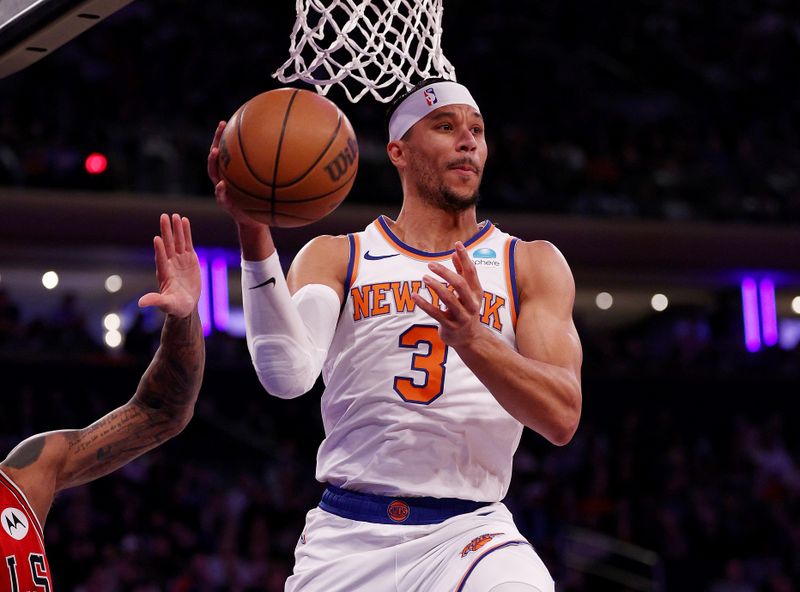 NEW YORK, NEW YORK - JANUARY 03: Josh Hart #3 of the New York Knicks passes the ball during the first half against the Chicago Bulls at Madison Square Garden on January 03, 2024 in New York City. NOTE TO USER: User expressly acknowledges and agrees that, by downloading and or using this photograph, User is consenting to the terms and conditions of the Getty Images License Agreement. (Photo by Elsa/Getty Images)