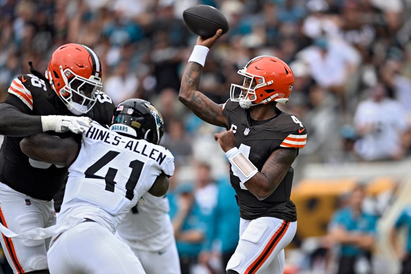 Cleveland Browns quarterback Deshaun Watson (4) throws a pass against the Jacksonville Jaguars during the first half of an NFL football game Sunday, Sept. 15, 2024, in Jacksonville, Fla. (AP Photo/Phelan M. Ebenhack)