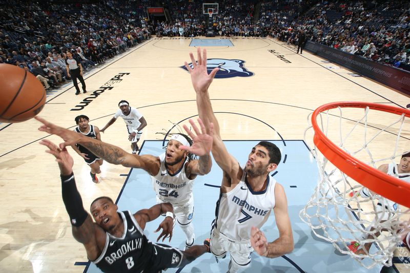 MEMPHIS, TN - February 26:  Lamar Stevens #24 of the Memphis Grizzlies blocks the shot of Lonnie Walker IV #8 of the Brooklyn Nets on February 26, 2024 at FedExForum in Memphis, Tennessee. NOTE TO USER: User expressly acknowledges and agrees that, by downloading and or using this photograph, User is consenting to the terms and conditions of the Getty Images License Agreement. Mandatory Copyright Notice: Copyright 2024 NBAE (Photo by Joe Murphy/NBAE via Getty Images)