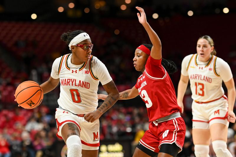 Feb 29, 2024; College Park, Maryland, USA;  Maryland Terrapins guard Shyanne Sellers (0) dribbles as Wisconsin Badgers guard Ronnie Porter (13) defends the passing lanes during the first half  at Xfinity Center. Mandatory Credit: Tommy Gilligan-USA TODAY Sports