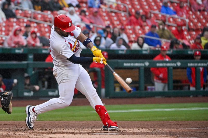 Apr 10, 2024; St. Louis, Missouri, USA;  St. Louis Cardinals catcher Ivan Herrera (48) hits a solo home run against the Philadelphia Phillies during the second inning at Busch Stadium. Mandatory Credit: Jeff Curry-USA TODAY Sports