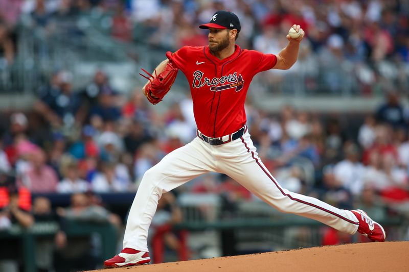 Apr 26, 2024; Atlanta, Georgia, USA; Atlanta Braves starting pitcher Chris Sale (51) throws against the Cleveland Guardians in the first inning at Truist Park. Mandatory Credit: Brett Davis-USA TODAY Sports
