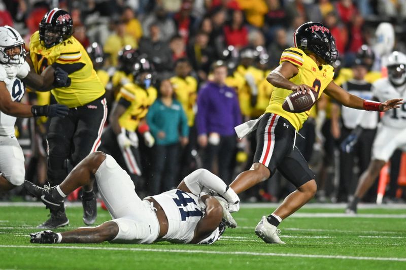 Nov 4, 2023; College Park, Maryland, USA; Penn State Nittany Lions linebacker Kobe King (41) sacks  Maryland Terrapins quarterback Taulia Tagovailoa (3) during the second half  at SECU Stadium. Mandatory Credit: Tommy Gilligan-USA TODAY Sports