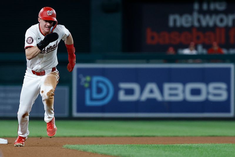 Sep 12, 2024; Washington, District of Columbia, USA; Washington Nationals outfielder Jacob Young (30) advances to third base on a throwing error against the Miami Marlins during the fourth inning at Nationals Park. Mandatory Credit: Geoff Burke-Imagn Images