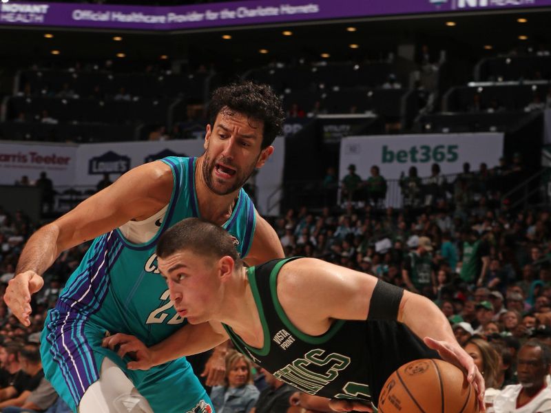 CHARLOTTE, NC - APRIL 1: Payton Pritchard #11 of the Boston Celtics handles the ball during the game against the Charlotte Hornets on April 1, 2024 at Spectrum Center in Charlotte, North Carolina. NOTE TO USER: User expressly acknowledges and agrees that, by downloading and or using this photograph, User is consenting to the terms and conditions of the Getty Images License Agreement. Mandatory Copyright Notice: Copyright 2024 NBAE (Photo by Kent Smith/NBAE via Getty Images)