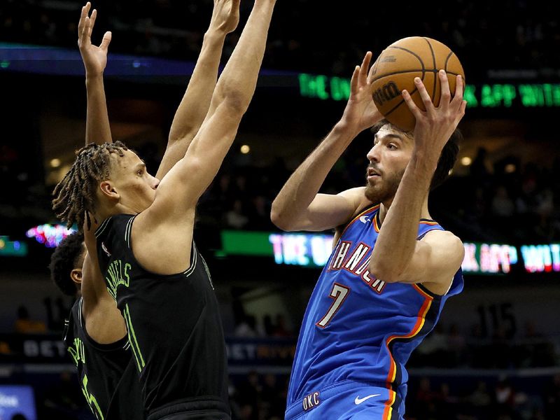 NEW ORLEANS, LOUISIANA - JANUARY 26: Chet Holmgren #7 of the Oklahoma City Thunder shoots over Dyson Daniels #11 of the New Orleans Pelicans during the fourth quarter of an NBA game at Smoothie King Center on January 26, 2024 in New Orleans, Louisiana. NOTE TO USER: User expressly acknowledges and agrees that, by downloading and or using this photograph, User is consenting to the terms and conditions of the Getty Images License Agreement. (Photo by Sean Gardner/Getty Images)