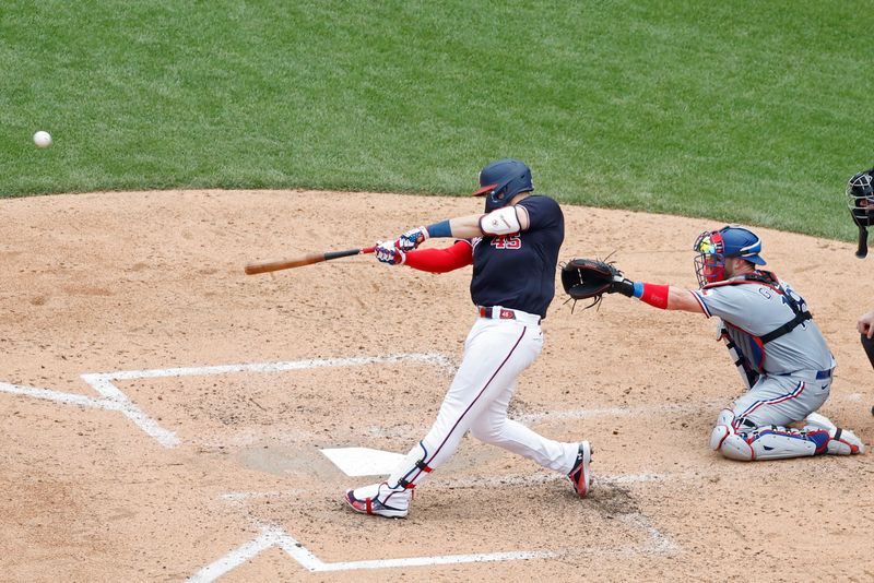 Jul 9, 2023; Washington, District of Columbia, USA; Washington Nationals designated hitter Joey Meneses (45) hits a home run against the Texas Rangers during the seventh inning at Nationals Park. Mandatory Credit: Geoff Burke-USA TODAY Sports