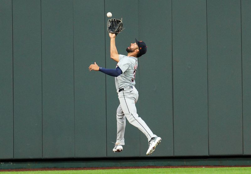 May 20, 2024; Kansas City, Missouri, USA; Detroit Tigers left fielder Riley Greene (31) makes a leaping catch at the wall during the sixth inning against the Kansas City Royals at Kauffman Stadium. Mandatory Credit: Jay Biggerstaff-USA TODAY Sports