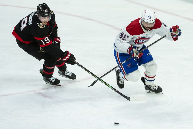 Apr 11, 2025; Ottawa, Ontario, CAN; Ottawa Senators right wing Drake Batherson (19) battles with Montreal Canadiens defenseman Alexandre Carrier (45) in the third period at the Canadian Tire Centre. Mandatory Credit: Marc DesRosiers-Imagn Images
