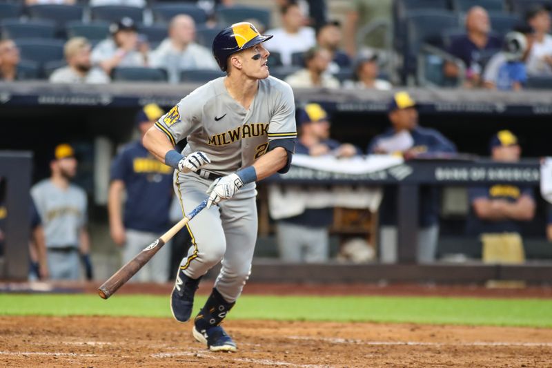 Sep 9, 2023; Bronx, New York, USA; Milwaukee Brewers right fielder Mark Canha (21) hits an RBI single in the eighth inning against the New York Yankees at Yankee Stadium. Mandatory Credit: Wendell Cruz-USA TODAY Sports