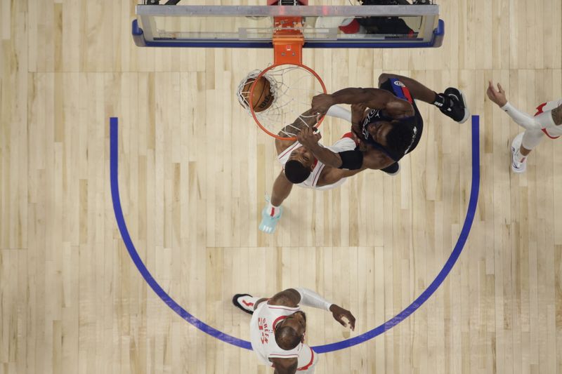 DETROIT, MI - JANUARY 12: Jalen Duren #0 of the Detroit Pistons dunks the ball during the game against the Houston Rockets on January 12, 2024 at Little Caesars Arena in Detroit, Michigan. NOTE TO USER: User expressly acknowledges and agrees that, by downloading and/or using this photograph, User is consenting to the terms and conditions of the Getty Images License Agreement. Mandatory Copyright Notice: Copyright 2024 NBAE (Photo by Brian Sevald/NBAE via Getty Images)