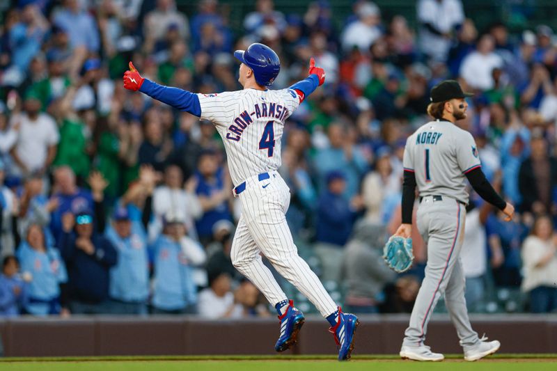 May 13, 2025; Chicago, Illinois, USA; Chicago Cubs center fielder Pete Crow-Armstrong (4) rounds the bases after hitting a solo home run against the Miami Marlins during the third inning at Wrigley Field. Mandatory Credit: Kamil Krzaczynski-Imagn Images
