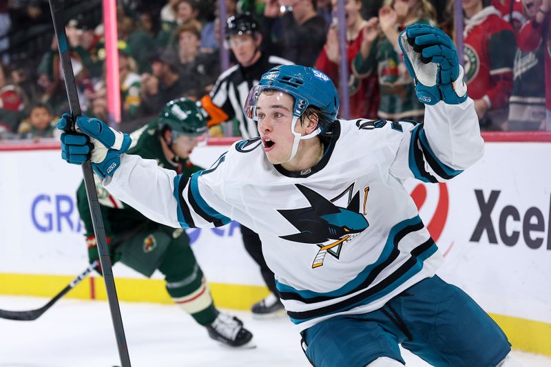 Oct 26, 2025; Saint Paul, Minnesota, USA; San Jose Sharks center Macklin Celebrini (71) celebrates his game winning overtime goal against the Minnesota Wild at Grand Casino Arena. Mandatory Credit: Matt Krohn-Imagn Images