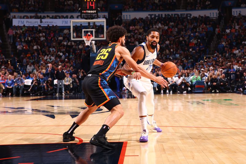 OKLAHOMA CITY, OK - NOVEMBER 17: Spencer Dinwiddie #26 of the Dallas Mavericks dribbles the ball during the game against the Oklahoma City Thunder on November 17, 2024 at Paycom Center in Oklahoma City, Oklahoma. NOTE TO USER: User expressly acknowledges and agrees that, by downloading and or using this photograph, User is consenting to the terms and conditions of the Getty Images License Agreement. Mandatory Copyright Notice: Copyright 2024 NBAE (Photo by Zach Beeker/NBAE via Getty Images)