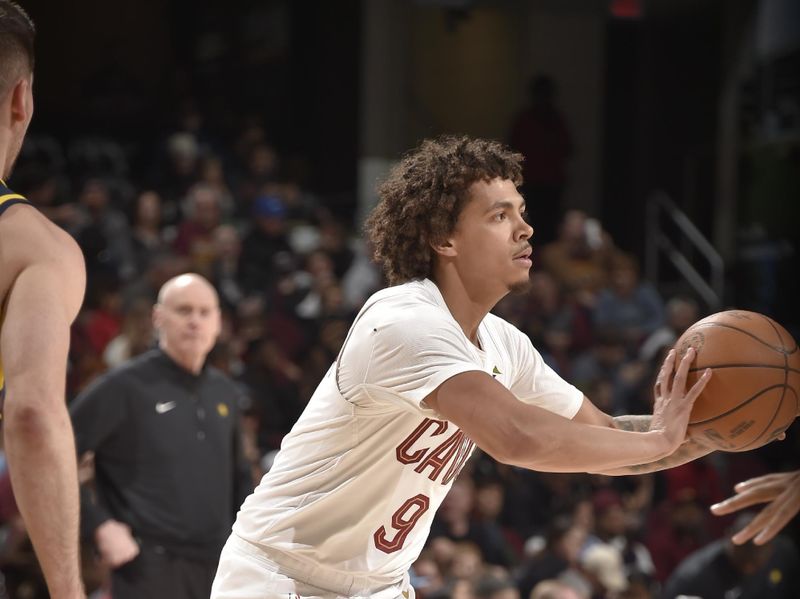 CLEVELAND, OH - APRIL 13:  Craig Porter Jr. #9 of the Cleveland Cavaliers passes the ball during the game against the Indiana Pacers on April 13, 2025 at Rocket Arena in Cleveland, Ohio. NOTE TO USER: User expressly acknowledges and agrees that, by downloading and/or using this Photograph, user is consenting to the terms and conditions of the Getty Images License Agreement. Mandatory Copyright Notice: Copyright 2025 NBAE (Photo by David Liam Kyle/NBAE via Getty Images)