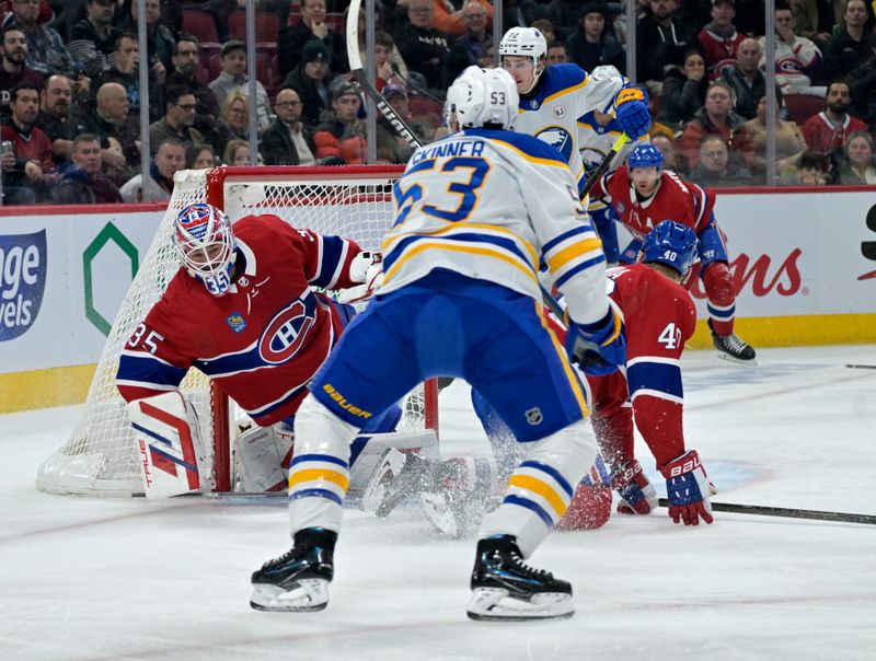 Feb 21, 2024; Montreal, Quebec, CAN; Buffalo Sabres forward Jeff Skinner (53) scores a goal against Montreal Canadiens goalie Sam Montembeault (35) during the second period at the Bell Centre. Mandatory Credit: Eric Bolte-USA TODAY Sports