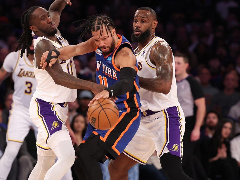 NEW YORK, NEW YORK - FEBRUARY 03:  Jalen Brunson #11 of the New York Knicks battles for the ball against Taurean Prince #12 of the Los Angeles Lakers and LeBron James #23 of the Los Angeles Lakers during their game at Madison Square Garden on February 03, 2024 in New York City.   User expressly acknowledges and agrees that, by downloading and or using this photograph, User is consenting to the terms and conditions of the Getty Images License Agreement.  (Photo by Al Bello/Getty Images)