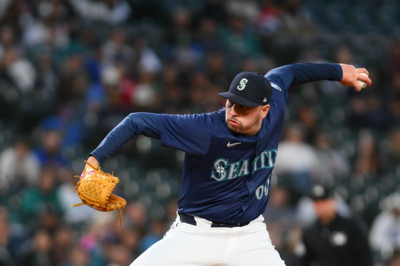 Jun 11, 2024; Seattle, Washington, USA; Seattle Mariners relief pitcher Tayler Saucedo (60) pitches to the Chicago White Sox during the eighth inning at T-Mobile Park. Mandatory Credit: Steven Bisig-USA TODAY Sports