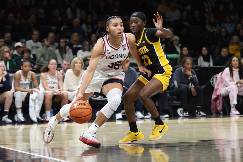 Iowa Hawkeyes Outpaced by UConn Huskies in Barclays Center Battle