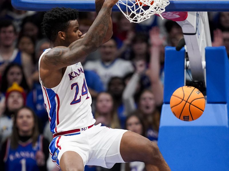 Jan 6, 2024; Lawrence, Kansas, USA; Kansas Jayhawks forward K.J. Adams Jr. (24) dunks the ball during the first half against the TCU Horned Frogs at Allen Fieldhouse. Mandatory Credit: Jay Biggerstaff-USA TODAY Sports