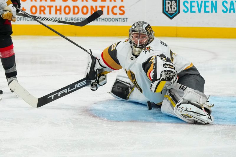 Mar 11, 2023; Raleigh, North Carolina, USA;  Vegas Golden Knights goaltender Jonathan Quick (32) makes a save against the Carolina Hurricanes during the third period at PNC Arena. Mandatory Credit: James Guillory-USA TODAY Sports