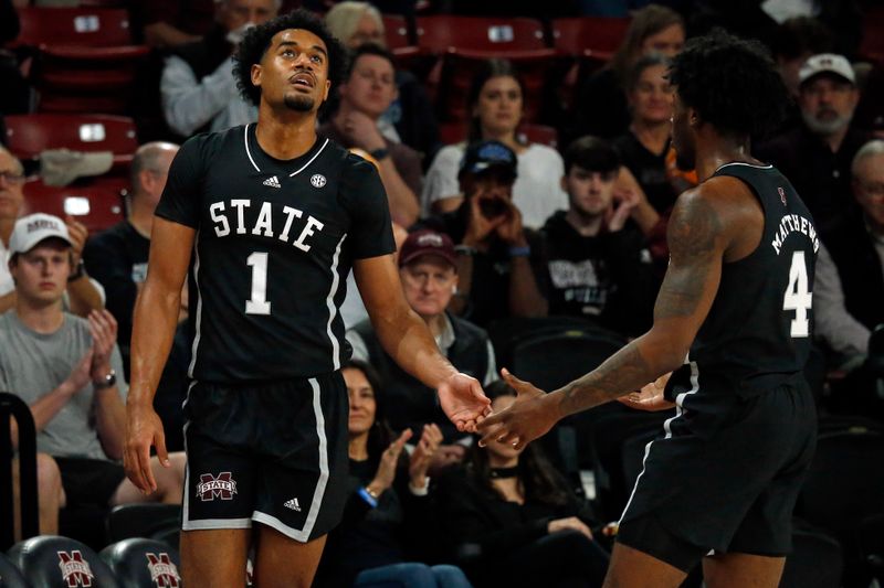 Jan 17, 2023; Starkville, Mississippi, USA; Mississippi State Bulldogs forward Tolu Smith (1) reacts with guard/forward Cameron Matthews (4) after a foul call during the first half against the Tennessee Volunteers at Humphrey Coliseum. Mandatory Credit: Petre Thomas-USA TODAY Sports