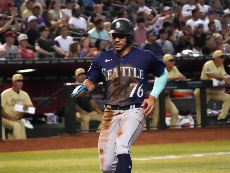 Jul 28, 2023; Phoenix, Arizona, USA; Seattle Mariners second baseman Jose Caballero (76) scores a run against the Arizona Diamondbacks during the seventh inning at Chase Field. Mandatory Credit: Joe Camporeale-USA TODAY Sports