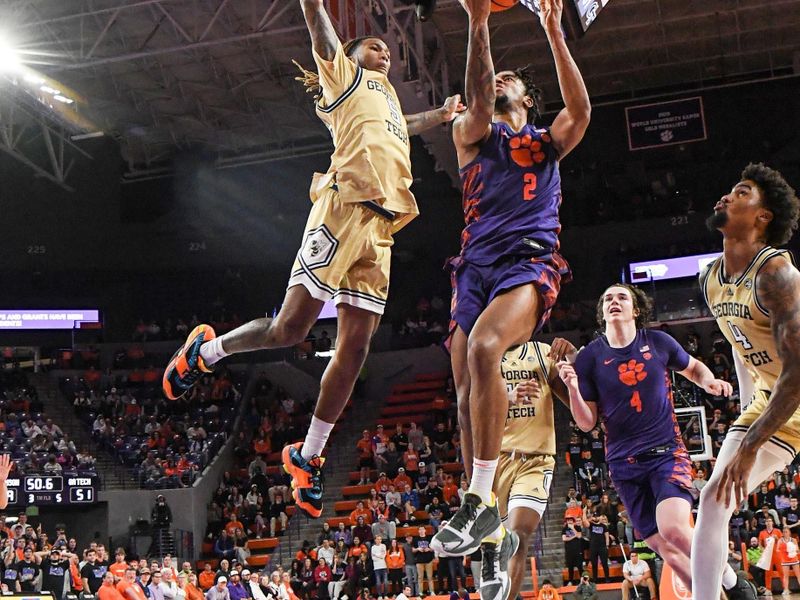 Jan 24, 2023; Clemson, South Carolina, USA; Clemson freshman guard Dillon Hunter (2) scores near Clemson forward Hunter Tyson (5) during the second half at Littlejohn Coliseum. Mandatory Credit: Ken Ruinard-USA TODAY Sports