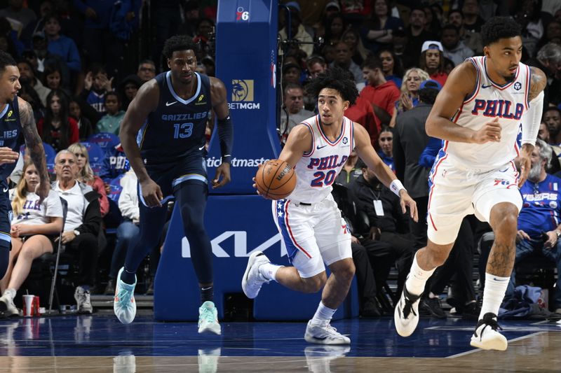 PHILADELPHIA, PA - NOVEMBER 2: Jared McCain #20 of the Philadelphia 76ers dribbles the ball during the game against the Memphis Grizzlies on November 2, 2024 at the Wells Fargo Center in Philadelphia, Pennsylvania NOTE TO USER: User expressly acknowledges and agrees that, by downloading and/or using this Photograph, user is consenting to the terms and conditions of the Getty Images License Agreement. Mandatory Copyright Notice: Copyright 2024 NBAE (Photo by David Dow/NBAE via Getty Images)