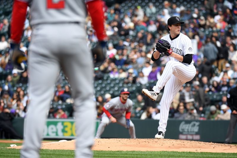 Apr 19, 2025; Denver, Colorado, USA; Colorado Rockies pitcher Chase Dollander (32) throws with runners on first and third during the fourth inning against the Washington Nationals at Coors Field. Mandatory Credit: Christopher Hanewinckel-Imagn Images