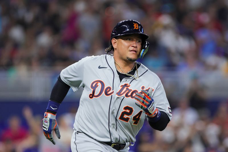 Jul 29, 2023; Miami, Florida, USA; Detroit Tigers designated hitter Miguel Cabrera (24) runs toward first base after hitting a single against the Miami Marlins during the ninth inning at loanDepot Park. Mandatory Credit: Sam Navarro-USA TODAY Sports