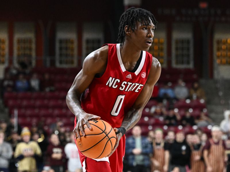 Feb 11, 2023; Chestnut Hill, Massachusetts, USA; North Carolina State Wolfpack guard Terquavion Smith (0) dribbles the ball against the Boston College Eagles during the first half at the Conte Forum. Mandatory Credit: Brian Fluharty-USA TODAY Sports