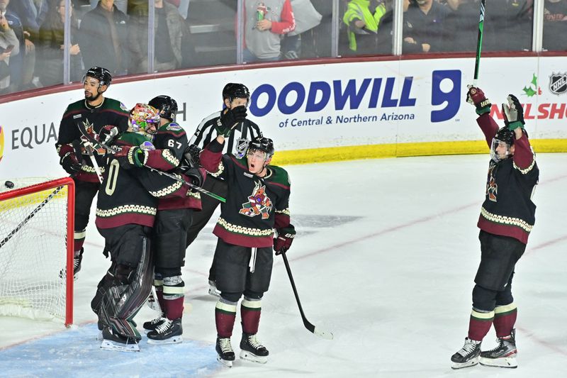 Dec 19, 2023; Tempe, Arizona, USA; The Arizona Coyotes celebrate after beating the Ottawa Senators 4-3 at Mullett Arena. Mandatory Credit: Matt Kartozian-USA TODAY Sports