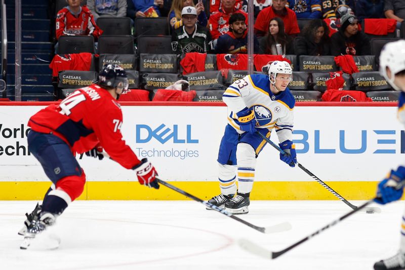 Nov 22, 2023; Washington, District of Columbia, USA; Buffalo Sabres left wing Jeff Skinner (53) skates with the puck as Washington Capitals defenseman John Carlson (74) defends in the second period at Capital One Arena. Mandatory Credit: Geoff Burke-USA TODAY Sports