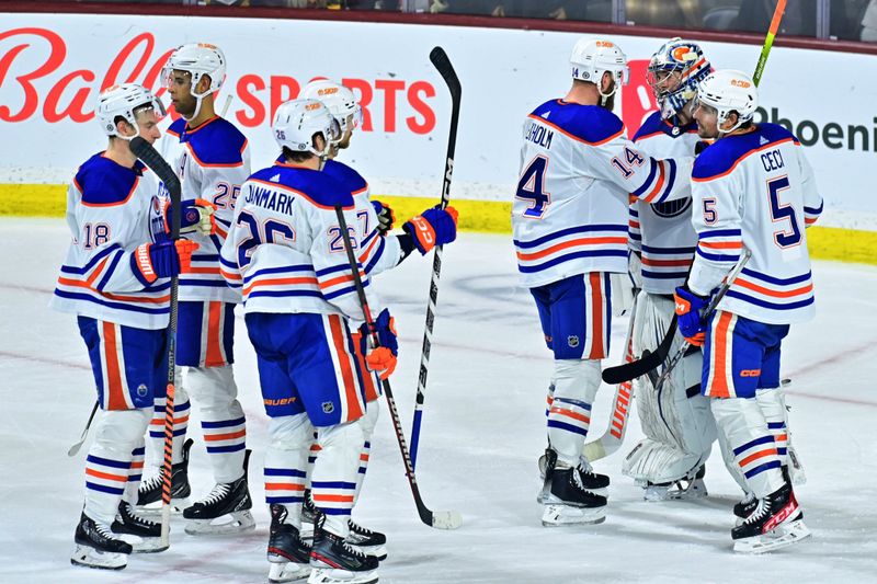 Mar 27, 2023; Tempe, Arizona, USA;  The Edmonton Oilers celebrate after beating the Arizona Coyotes 5-4 at Mullett Arena. Mandatory Credit: Matt Kartozian-USA TODAY Sports