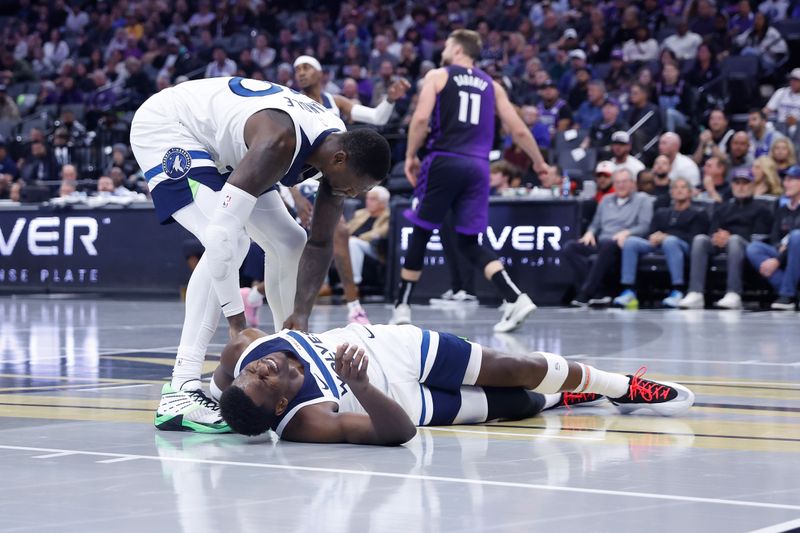 SACRAMENTO, CALIFORNIA - NOVEMBER 15: Anthony Edwards #5 of the Minnesota Timberwolves reacts on the floor after a play in the second quarter against the Sacramento Kings during the Emirates NBA Cup game at Golden 1 Center on November 15, 2024 in Sacramento, California. NOTE TO USER: User expressly acknowledges and agrees that, by downloading and or using this photograph, User is consenting to the terms and conditions of the Getty Images License Agreement (Photo by Lachlan Cunningham/Getty Images)