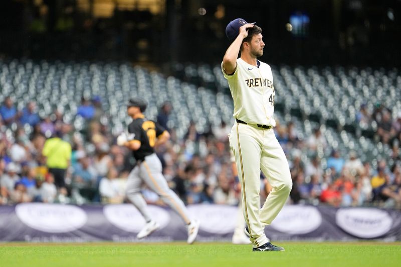 Jul 9, 2024; Milwaukee, Wisconsin, USA;  Milwaukee Brewers pitcher Colin Rea (48) reacts after giving up a Honme run to Pittsburgh Pirates designated hitter Bryan Reynolds (10) during the second inning at American Family Field. Mandatory Credit: Jeff Hanisch-USA TODAY Sports