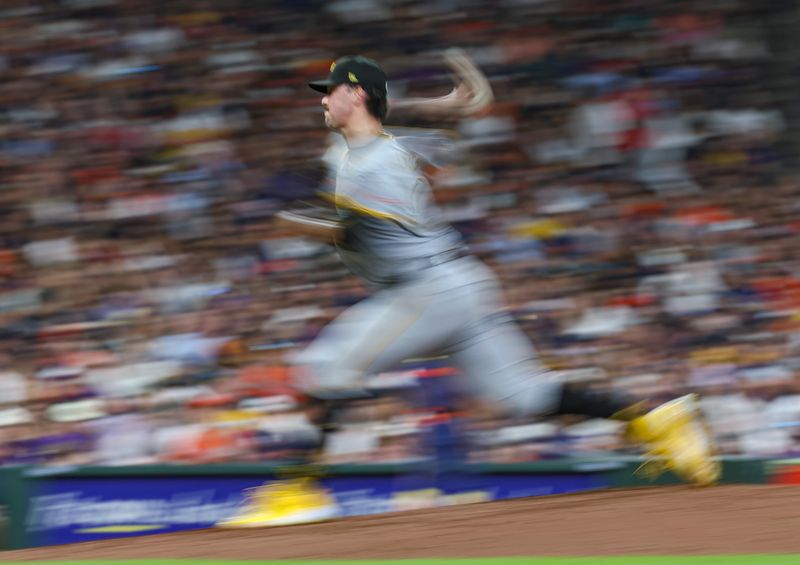 Jul 29, 2024; Houston, Texas, USA; Pittsburgh Pirates starting pitcher Paul Skenes (30) delivers a pitch during the fifth inning against the Houston Astros at Minute Maid Park. Mandatory Credit: Troy Taormina-USA TODAY Sports
