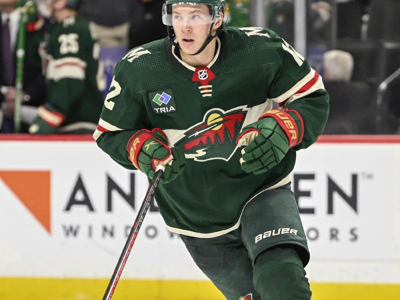 Apr 11, 2023; Saint Paul, Minnesota, USA;  Minnesota Wild forward Matt Boldy (12) turns up ice against the Winnipeg Jets during the third period at at Xcel Energy Center. Mandatory Credit: Nick Wosika-USA TODAY Sports