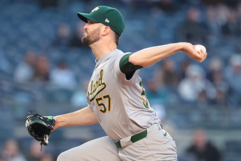 Apr 25, 2024; Bronx, New York, USA; Oakland Athletics starting pitcher Alex Wood (57) delivers a pitch during the first inning against the New York Yankees at Yankee Stadium. Mandatory Credit: Vincent Carchietta-USA TODAY Sports