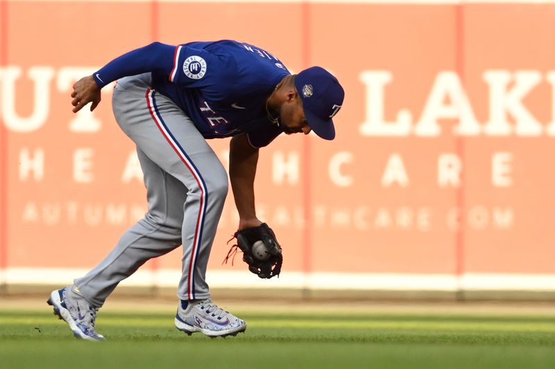 Jun 28, 2024; Baltimore, Maryland, USA;  Texas Rangers second baseman Marcus Semien (2) field  first inning ground ball against the Baltimore Orioles at Oriole Park at Camden Yards. Mandatory Credit: Tommy Gilligan-USA TODAY Sports