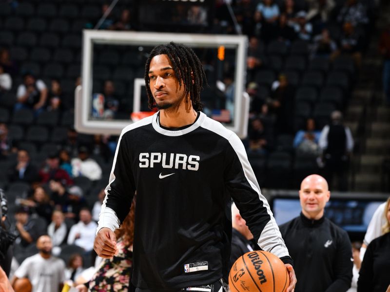 SAN ANTONIO, TX - JANUARY 15: Stephon Castle #5 of the San Antonio Spurs warms up before the game against the Memphis Grizzlies on January 15, 2025 at the Frost Bank Center in San Antonio, Texas. NOTE TO USER: User expressly acknowledges and agrees that, by downloading and or using this photograph, user is consenting to the terms and conditions of the Getty Images License Agreement. Mandatory Copyright Notice: Copyright 2025 NBAE (Photos by Barry Gossage/NBAE via Getty Images)